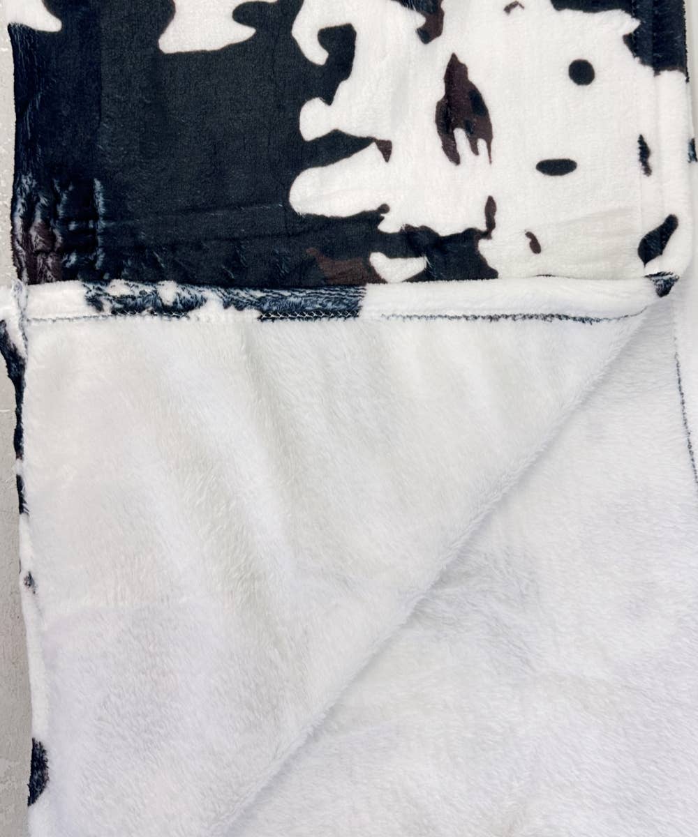 COW PRINT FLANNEL BLANKET